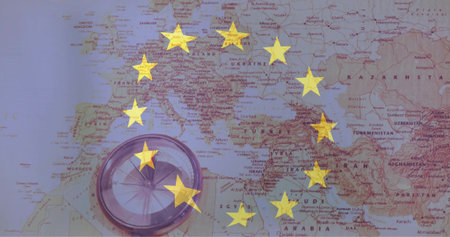 Displaying paper political map of Europe, North Africa and Western Asia, with EU stars and compass....