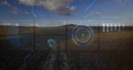 Displaying wide grassy plain, dirt track toward low hill on horizon, showing HUD reticle and globe. Grassland, overlay, circuit, digital, futuristic, blue, remote