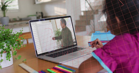 Writing child in purple top watching instructor on laptop at wooden table, notebook, copy space. Education, learning, home, student, teacher, remote, screen