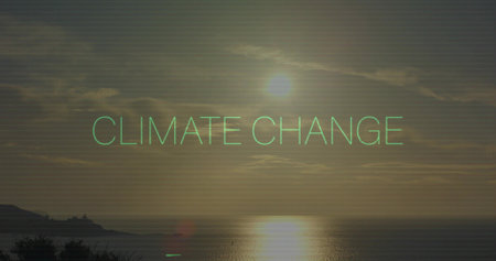 Glowing neon-green text CLIMATE CHANGE spanning coastal sea at sunset, showing sun reflection. Overlay, glitch, retro, ocean, horizon, silhouette, panoramic