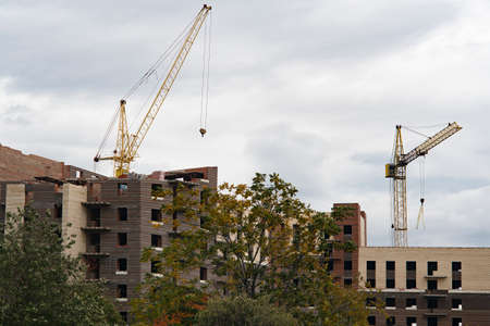 Construction of residential many floors with many cranes.