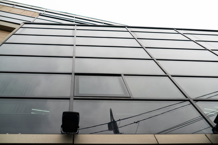 Abstract close up of glass building facade. An example of modern architecture in a commercial...