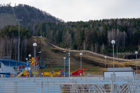 Ski slope on the mountain in autumn. Ski slope without snow.の写真素材
