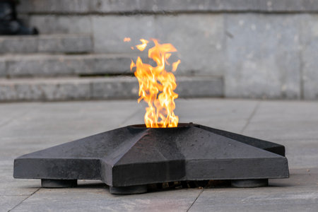 Eternal flame in memory of the fallen soldiers in the war. The pedestal of the eternal flame in the...