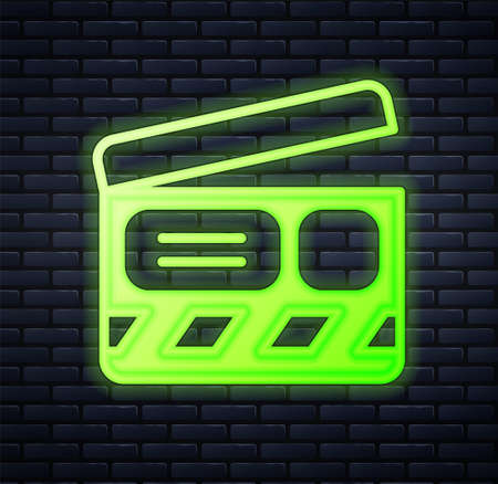Glowing neon Movie clapper icon isolated on brick wall background. Film clapper board. Clapperboard sign. Cinema production or media industry. Vectorのイラスト素材