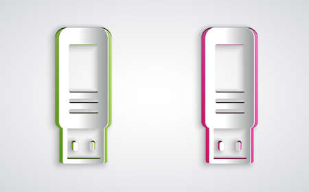 Paper cut USB flash drive icon isolated on grey background. Paper art style. Vectorのイラスト素材