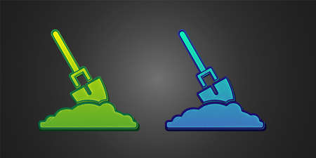 Green and blue Shovel in the ground icon isolated on black background. Gardening tool. Tool for horticulture, agriculture, farming. Vectorのイラスト素材