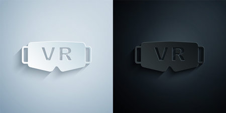 Paper cut Virtual reality glasses icon isolated on grey and black background. Stereoscopic 3d vr mask. Optical head mounted display. Paper art style. Vectorのイラスト素材