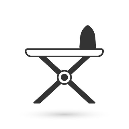 Grey Electric iron and ironing board icon isolated on white background. Steam iron. Vectorのイラスト素材