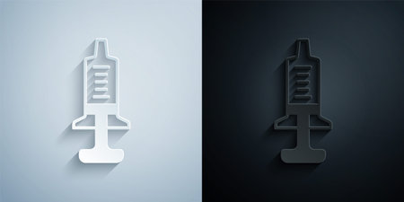Paper cut Syringe icon isolated on grey and black background. Syringe for vaccine, vaccination, injection, flu shot. Medical equipment. Paper art style. Vectorのイラスト素材