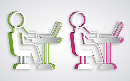 Paper cut Freelancer icon isolated on grey background. Freelancer man working on laptop at his house. Online working, distant job concept. Paper art style. Vectorのイラスト素材