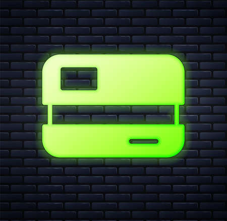 Glowing neon Credit card icon isolated on brick wall background. Online payment. Cash withdrawal. Financial operations. Shopping sign. Vectorのイラスト素材