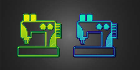Green and blue Sewing machine icon isolated on black background. Vector