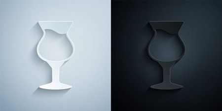 Paper cut Glass of beer icon isolated on grey and black background. Paper art style. Vectorのイラスト素材