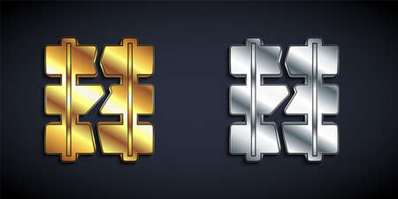 Gold and silver Broken or cracked rails on a railway icon isolated on black background. Long shadow style. Vectorのイラスト素材