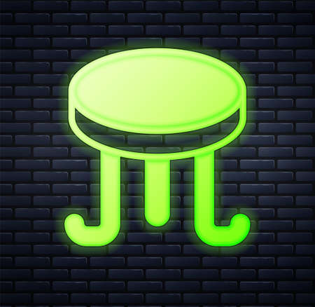 Glowing neon Coffee table icon isolated on brick wall background. Street cafe. Vectorのイラスト素材