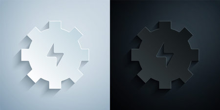 Paper cut Gear and lightning icon isolated on grey and black background. Electric power. Lightning bolt sign. Paper art style. Vectorのイラスト素材