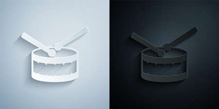 Paper cut Drum with drum sticks icon isolated on grey and black background. Music sign. Musical instrument symbol. Paper art style. Vectorのイラスト素材