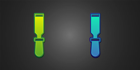 Green and blue Chisel tool for wood icon isolated on black background. Vectorのイラスト素材