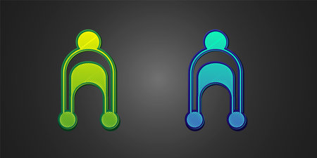 Green and blue Winter hat icon isolated on black background. Vectorのイラスト素材