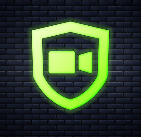 Glowing neon Video chat conference icon isolated on brick wall background. Online meeting work form home. Remote project management. Vectorのイラスト素材