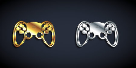 Gold and silver Game controller or joystick for game console icon isolated on black background. Long shadow style. Vectorのイラスト素材