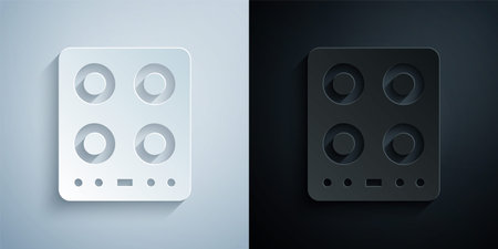 Paper cut Gas stove icon isolated on grey and black background. Cooktop sign. Hob with four circle burners. Paper art style. Vectorのイラスト素材