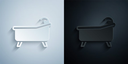 Paper cut Bathtub icon isolated on grey and black background. Paper art style. Vectorのイラスト素材