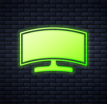 Glowing neon Computer monitor icon isolated on brick wall background. PC component sign. Vectorのイラスト素材