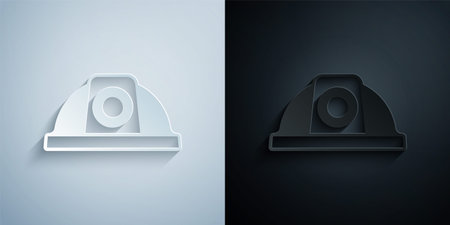 Paper cut Worker safety helmet icon isolated on grey and black background. Paper art style. Vectorのイラスト素材
