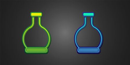 Green and blue Bottle with potion icon isolated on black background. Flask with magic potion. Happy Halloween party. Vectorのイラスト素材