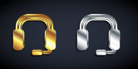 Gold and silver Headphones icon isolated on black background. Earphones. Concept for listening to music, service, communication and operator. Long shadow style. Vectorのイラスト素材