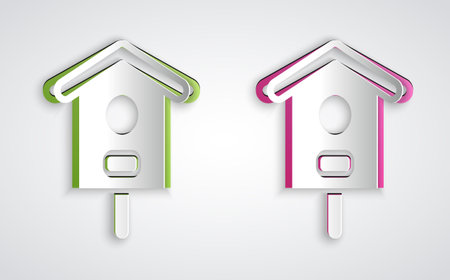 Paper cut Bird house icon isolated on grey background. Nesting box birdhouse, homemade building for birds. Paper art style. Vectorのイラスト素材