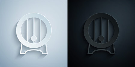 Paper cut Wooden barrel on rack with stopcock icon isolated on grey and black background. Paper art style. Vectorのイラスト素材