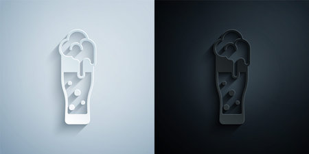 Paper cut Glass of beer icon isolated on grey and black background. Happy Saint Patricks day. National Irish holiday. Paper art style. Vectorのイラスト素材