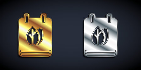 Gold and silver Calendar with autumn leaves icon isolated on black background. Long shadow style. Vectorのイラスト素材