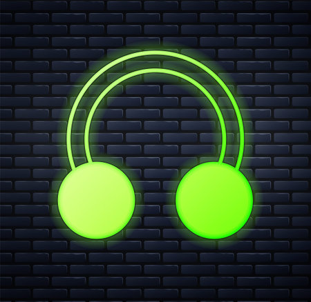 Glowing neon Piercing icon isolated on brick wall background. Vectorのイラスト素材