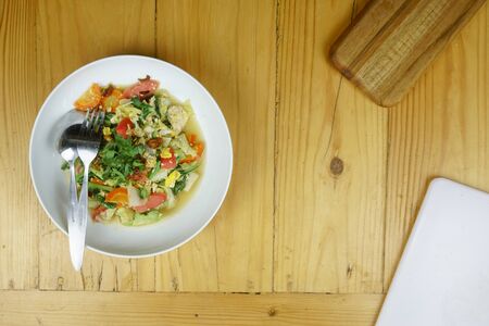 Cap cay Indonesian stir fry food on the wooden backgroundの写真素材