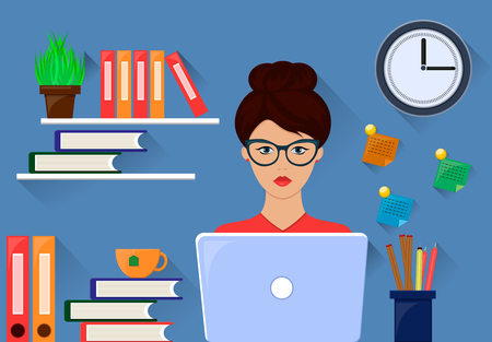 A brunette woman works at a desk.のイラスト素材