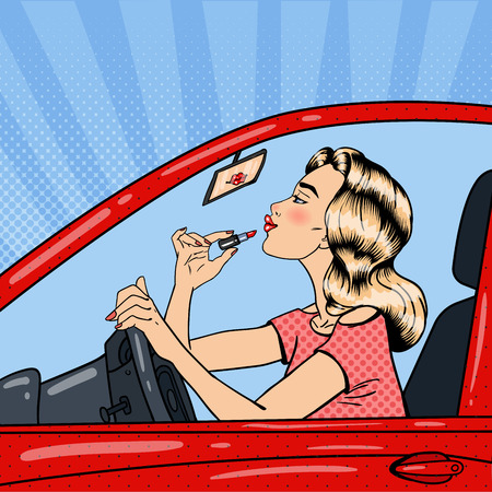 Pretty Blonde Woman Applying Lipstick While Driving a Car. Pop Art Vector illustrationのイラスト素材