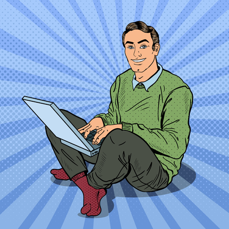 Pop Art Smiling Young Man Working with Laptop. Vector illustrationのイラスト素材