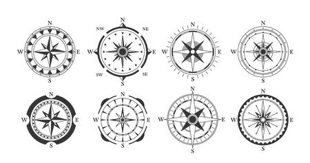 Collection Of Vintage Compass Designs Featuring Directional Arrows Pointing North, South, East And West, Vector Setのイラスト素材
