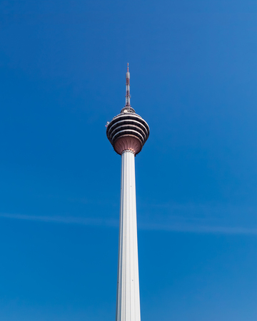 KUALA LUMPUR, MALAYSIA - FEBRUARY 11, 2018 : KL Tower against blue sky. it is second tallest tower in the country rises 421 meters high and stands on a hill in the city center.のeditorial素材