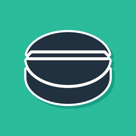 Blue Medicine pill or tablet icon isolated on green background. Capsule pill and drug sign. Pharmacy design. Vector Illustrationのイラスト素材