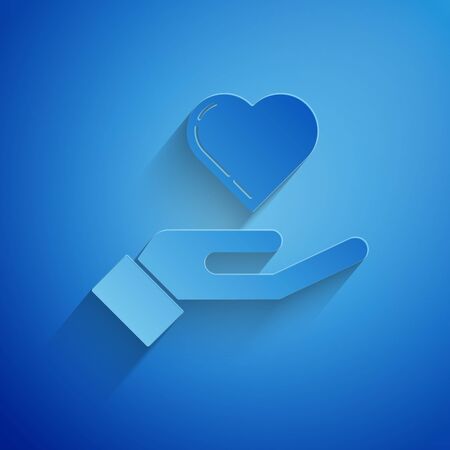 Paper cut Heart on hand icon isolated on blue background. Hand giving love symbol. Paper art style. Vector Illustrationのイラスト素材