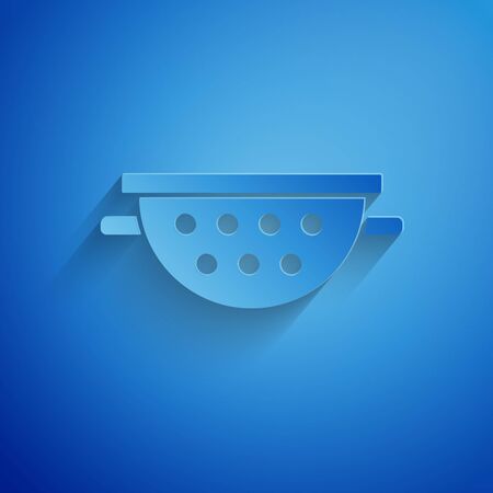 Paper cut Kitchen colander icon isolated on blue background. Cooking utensil. Cutlery sign. Paper art style. Vector Illustrationのイラスト素材