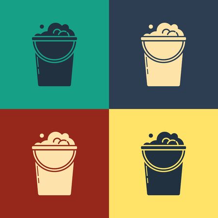 Color Bucket with foam and bubbles icon isolated on color background. Cleaning service concept. Vintage style drawing. Vector Illustrationのイラスト素材
