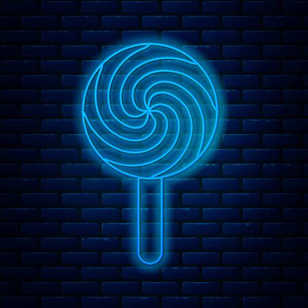 Glowing neon line Lollipop icon isolated on brick wall background. Food, delicious symbol. Vector Illustrationのイラスト素材