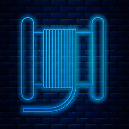 Glowing neon line Wire electric cable on a reel or drum icon isolated on brick wall background. Vector Illustrationのイラスト素材