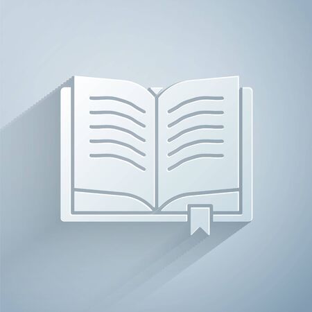 Paper cut Ancient magic book with alchemy recipes and mystic spells and enchantments icon isolated on grey background. Paper art style. Illustrationのイラスト素材
